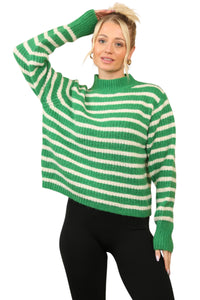 Model wearing a cosy green and white striped jumper with a mock neck, long sleeves, and a relaxed fit. The jumper is made of soft acrylic