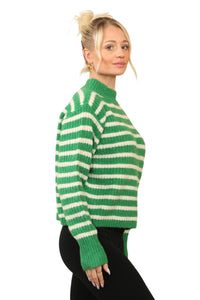 Model wearing a cosy green and white striped jumper with a mock neck, long sleeves, and a relaxed fit. The jumper is made of soft acrylic