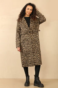 long line leopard print coat with button closure, large front pockets, and a back slit.